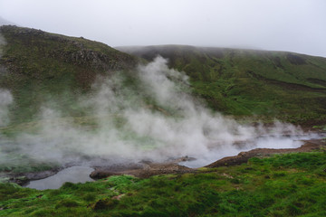 Steamy field by the hot river in Reykjadalur