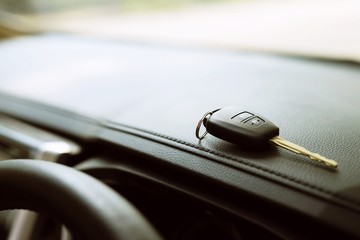 Car keys on leather seats