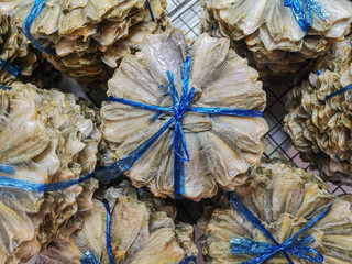 Close up of dried fish is Thai food made from stingray(Imbreicated stingray).Sun-dried Stingray fish.