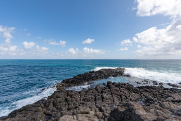 Sainte-Anne, Martinique, FWI - Waves in  the blue eye hole (oeil bleu) in Ferré Cape