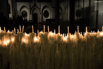 Candles in church in the dark