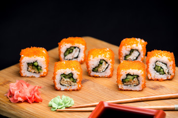 Tasty california sushi roll with shrimps and cucumber.