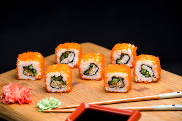 Tasty california sushi roll with shrimps and cucumber.