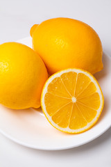 lemons on white background close up