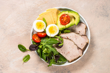 Keto diet plate on white table.