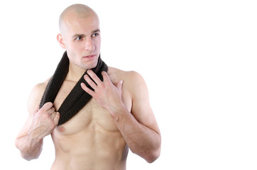 Fototapeta premium Winter and cold. Handsome man undresses.