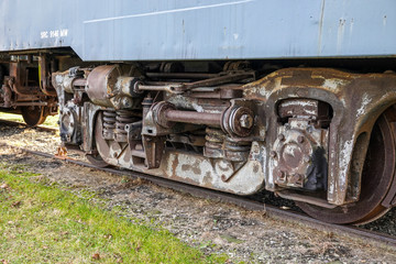 Fototapeta na wymiar Old rusted railroad train wheel assembly