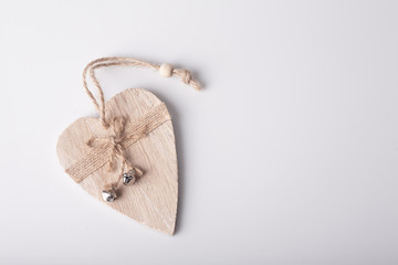 Decorative wooden heart on a white background. Holidays. Valentine's Day.