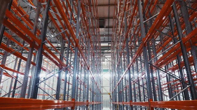 large metal racks installed in spacious modern warehouse