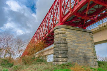 Fototapeta na wymiar long red old bridge