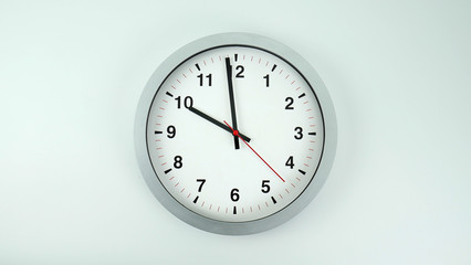 Gray clock beginning of time 09.59 am or pm, on white background, Copy space for your text, Time...