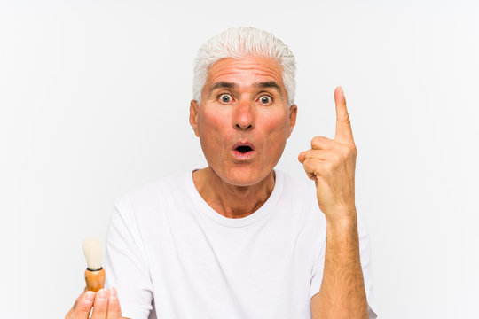 Senior caucasian man recently shaved having some great idea, concept of creativity.