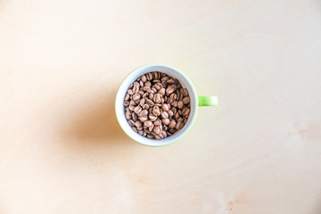 Coffee mug with beans