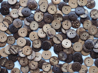 Obraz premium Wooden buttons pattern, Buttons made from Coconut shell, Can use as wallpaper or background.