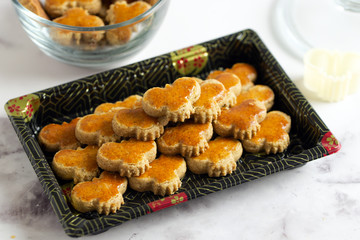 Stack of green bean almond cookies, popular treat during Chinese New Year