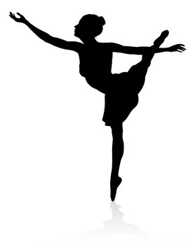 Silhouette ballet dancer woman dancing in a pose or position