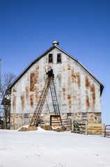 vintage and weathered barn with ladder