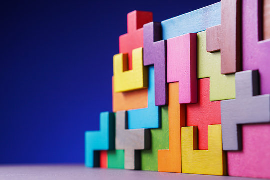 Geometric shapes on a blue background.	