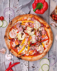 pizza with tomatoes and pepper
