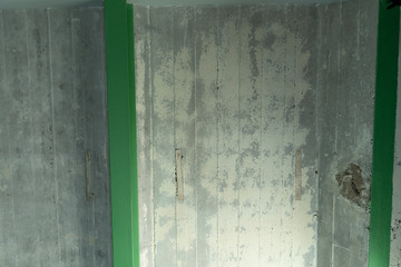 Abstract ceiling of concrete made of plates and green beams