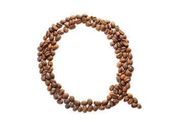 Coffee beans. Letter Q made from coffee beans on a white background. Brown