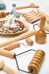 Aromatic herbal massage bags with herbs and wooden maderotherapy tool