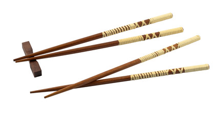 Wooden pair of chopsticks on a white background