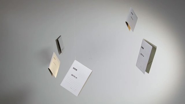 Folder a lot of data document rotate slow mo on white background archive papers.