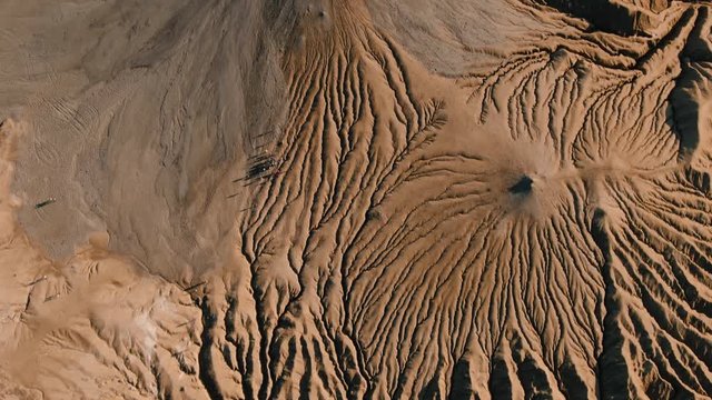 Aerial Drone Close Up View Over Active Mud Volcanoes, Muddy Volcanoes Reservation in Mountains, Mud Domes Erupting