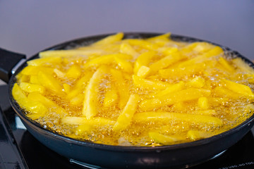 French Fries on a black pan