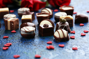 Flowers composition. Frame made of rose flowers, confetti. Valentine's Day background.