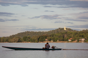 Fototapeta na wymiar Buddha statue on Mekong river