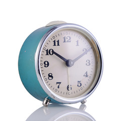 Blue retro alarm clock on a white isolated background, close-up.