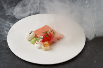 Salmon, trout with quail egg creamy mousse and green mayonnaise