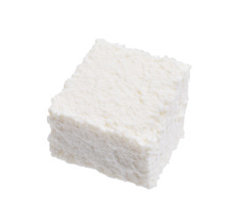 Ricotta cheese cube isolate on white. Macro focus stacking, clipping path.