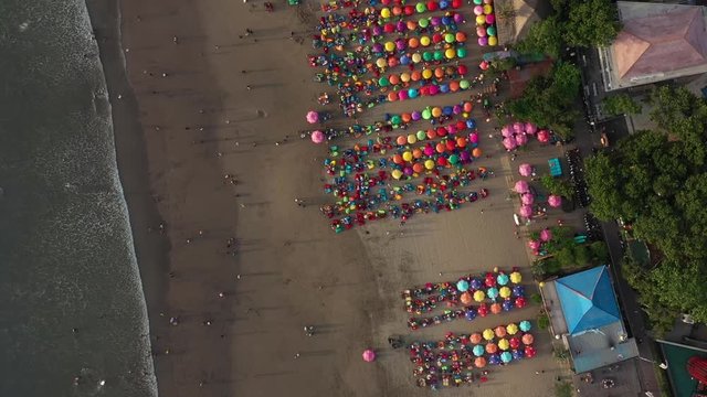 Aerial high angle view of the Beach With Parasols And Beanbags, double six beach, Kuta Bali Indonesia