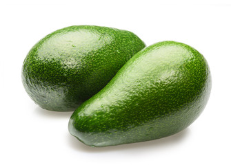 two avocados isolated on white