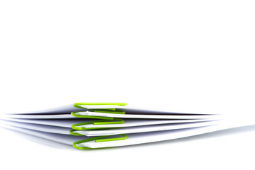 Pile of blank document with paper clip on white background