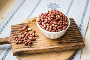 Roasted peanuts or groundnut legume edible seeds.
