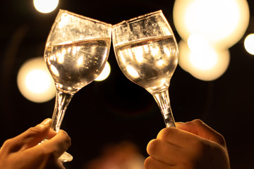 champagne toast with two glasses