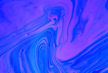 Abstract pink and blue marble background. Game of colors. Wallpaper, mixing, modern art. Background for web design, the cover of the notebook.