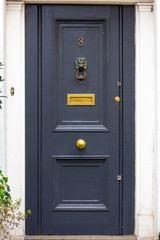 Beautiful front door with the house number 3
