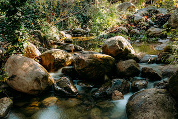 Long exposure of creek running in the California mountains