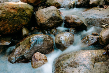 Long exposure of creek running in the California mountains