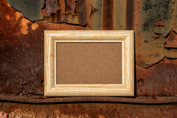 Empty Picture Frame on Vintage Rusty Metal Shelf
