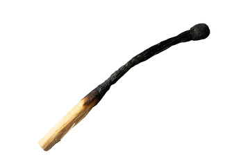 Burnt match isolated on a white background. Close up.