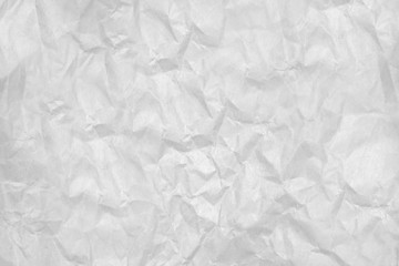 Crumpled sheet of white paper square shape.Texture or background