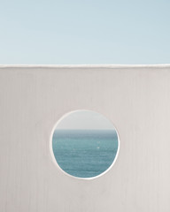 Wall with hole water and blue sky background. Creative, minimal, styled concept for bloggers.