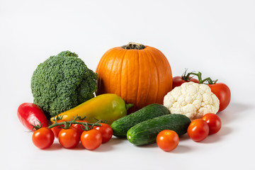 Healthy food concept. Vegetables on white background. Banner. Pumpkin, tomatoes, cucumbers, peppers, cauliflower and broccoli.
