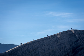 Tourist walk on the creater of Bromo. Mount Bromo is an active volcano and one of the most visited tourist attractions in East Java, Indonesia.